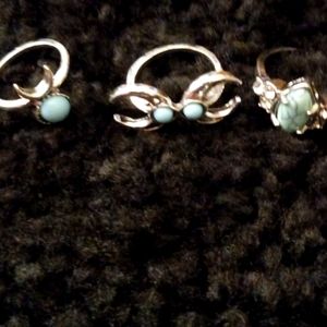 Three silver tone fashion rings